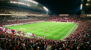 Apostador siguiendo un partido de la J-League en directo con mercados de apuestas en vivo abiertos